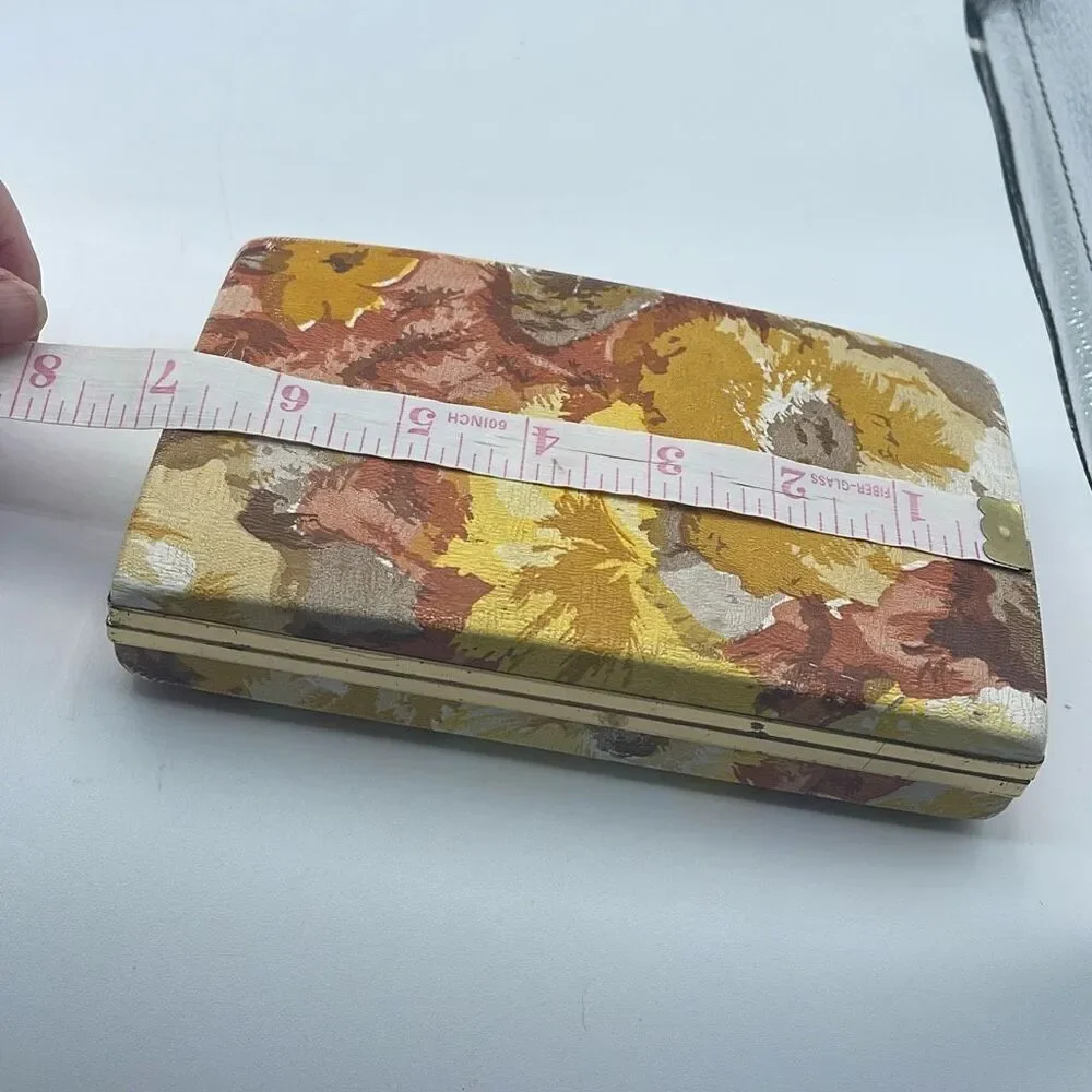 Vintage 70’s pierced earrings case. Golden rod floral print.